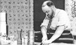 Philip Harben cutting up the potatoes for the chips!