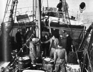 A last-minute briefing for technicians from producer Barrie Edgar aboard the 'Lowestoft Lady' during rehearsals for the visit to the herring fleet.