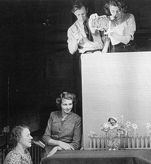 The puppeteers are Martin Grainger and Audrey Atterby and looking on are Maria Bird and Janet Ferber.